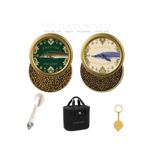 The KHAVIYAR flash bundle line up: two 30g caviar tins, a mother of pearl caviar spoon, the bespoke tin opener keychain and the Caspian Cooler Bag.
