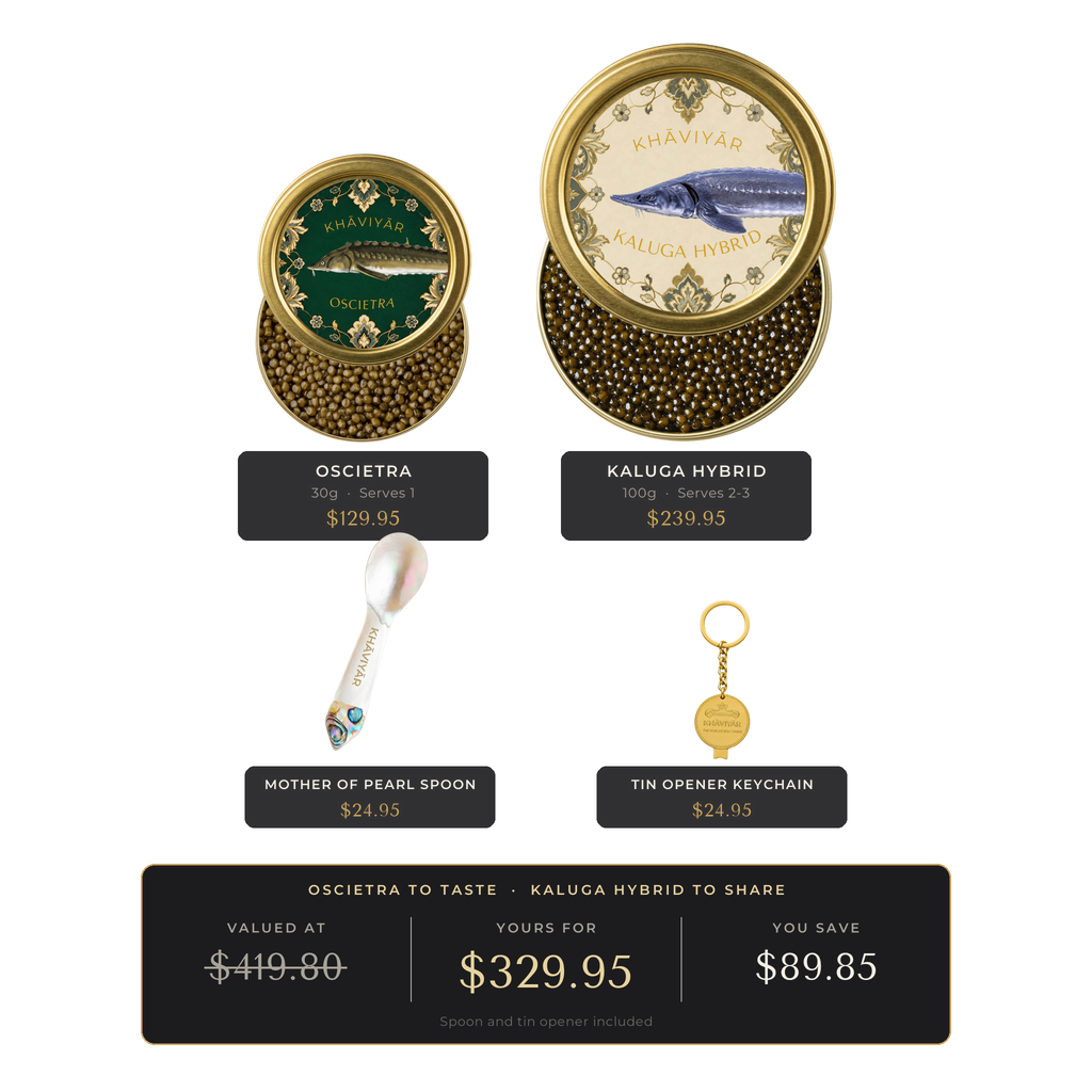 KHAVIYAR Caviar Pairing Bundle: a 30g Oscietra tin beside a much larger 100g Kaluga Hybrid tin, with the mother of pearl spoon and gold tin opener keychain. Valued at $419.80, yours for $329.95.